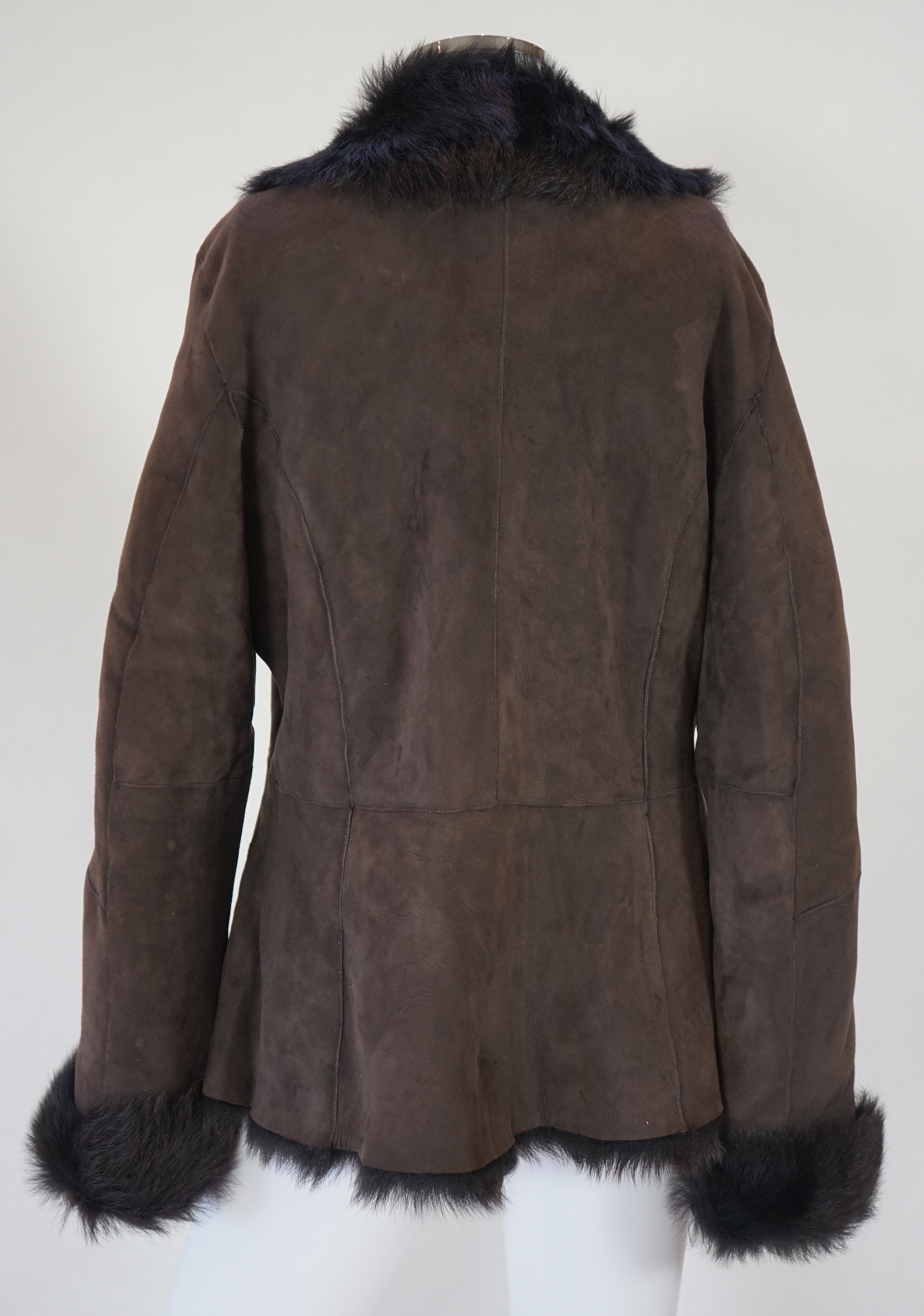 A lady's L K Bennett brown shearling jacket, size Large